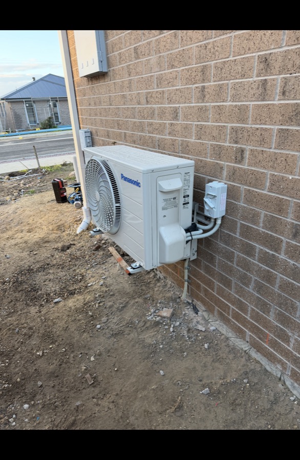 Panasonic split system air conditioner installed on new build